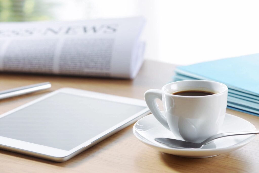 qtq80-o2yCJB newspaper and coffee table