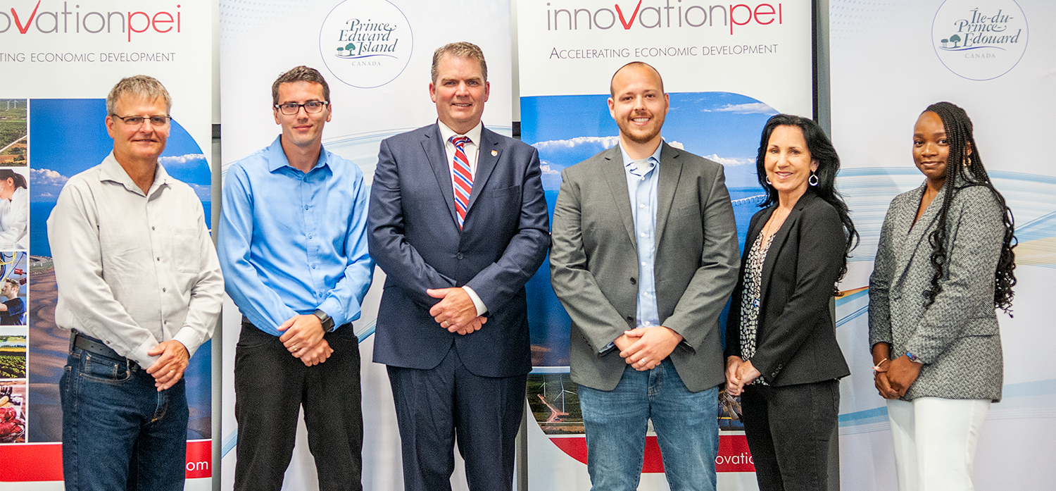 From left: Ian Lucas and Dr. Matthew Dunlop (Tunistrong Technologies Incorporated), Minister Bloyce Thompson, Dylan MacLennan (L’nu Energy Inc.), Kristin Lund (CollaborationSchool.Com) and Rachael Sonola (Sonola Sweets).